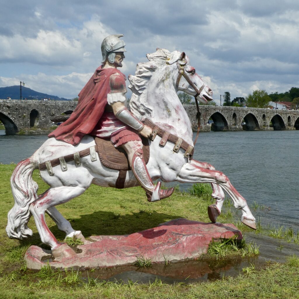 Statue of Roman General on the bank of the river in Ponte de Lima Portugal