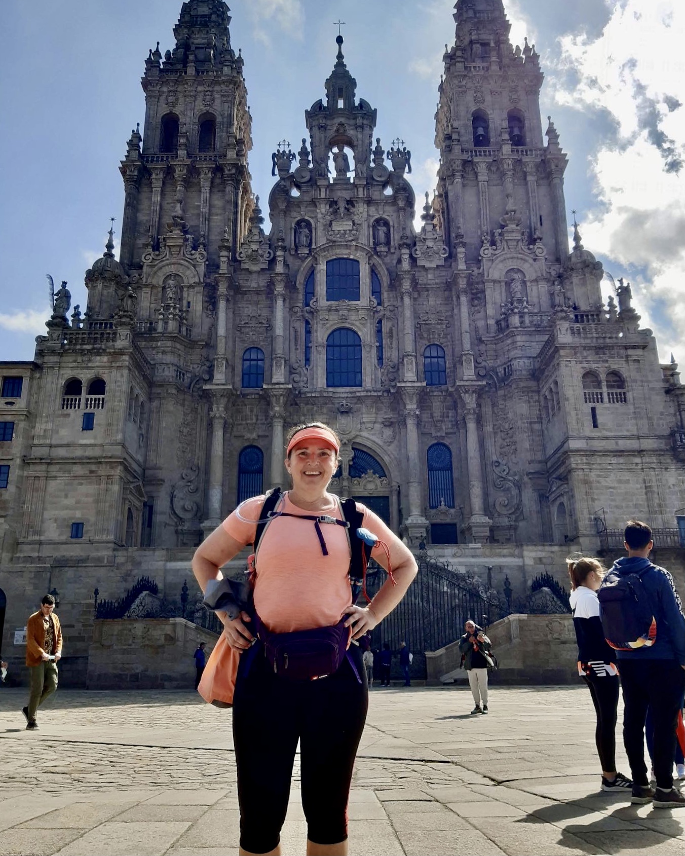 Alison in front of the Cathedral in Santiago after completing the Camino Portugues