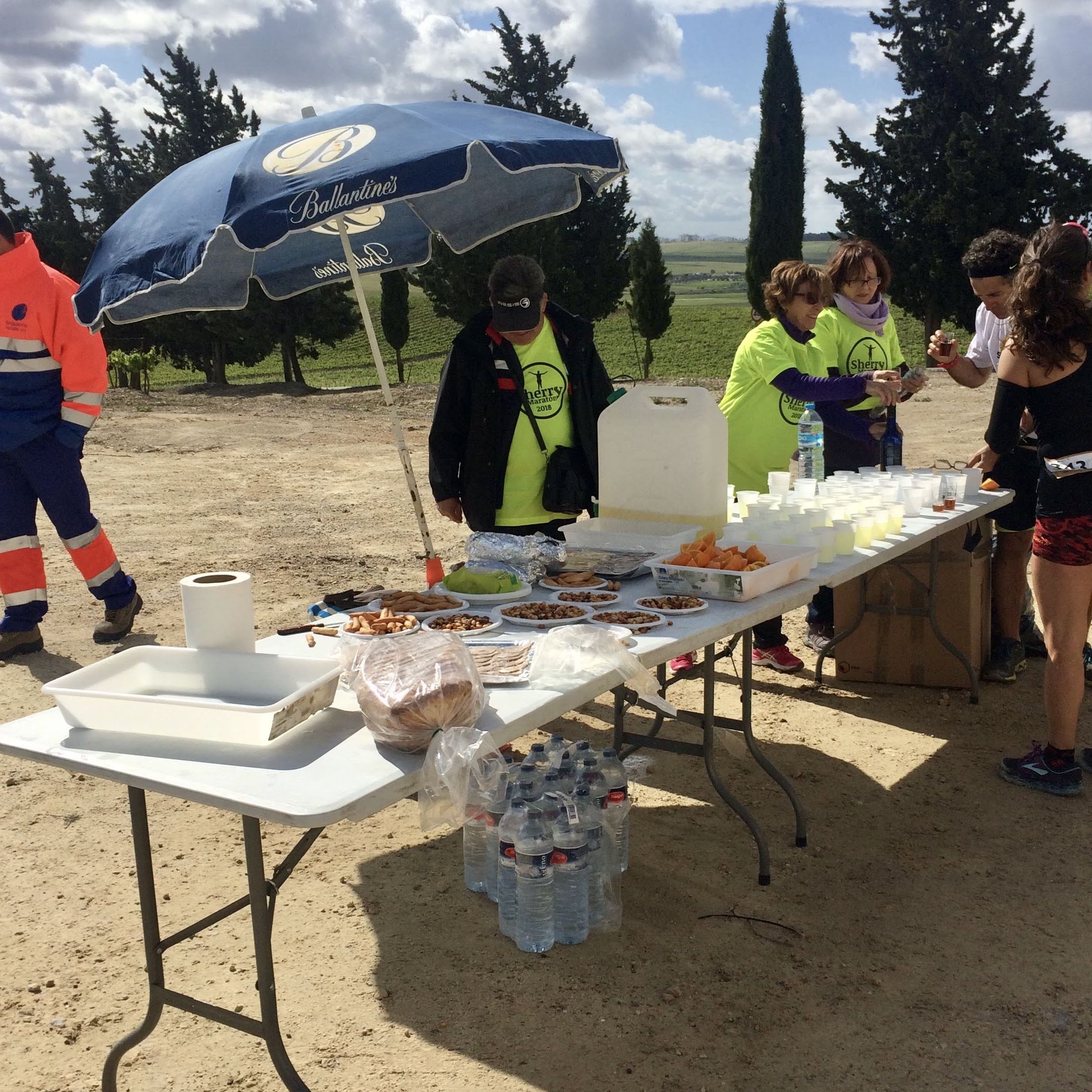 A refreshment stand at the Sherry Marathon in Jerez de la Frontera serving local delicacies as well as water