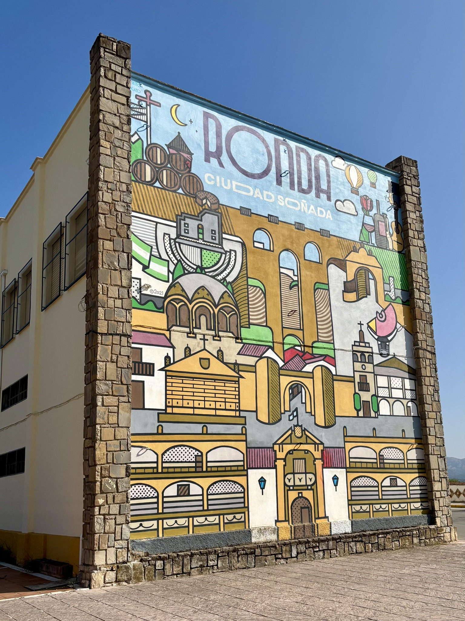 Mural de Ronda - the iconic images of Ronda painted on the end of a building
